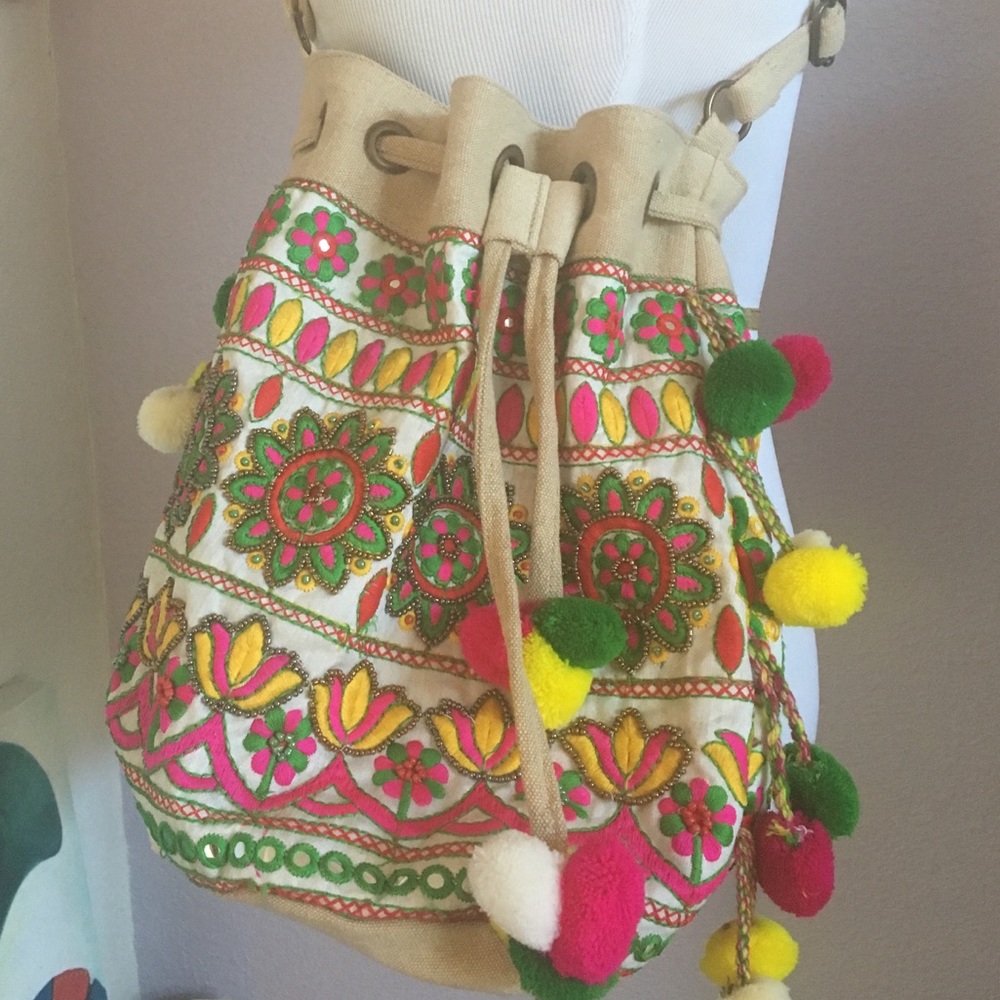 Beautiful and roomy hand stitched  bag w. pom poms